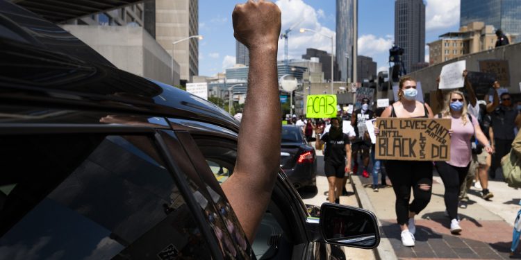 Protesters in Atlanta, Paris, London and other cities call attention to deaths of two more black men