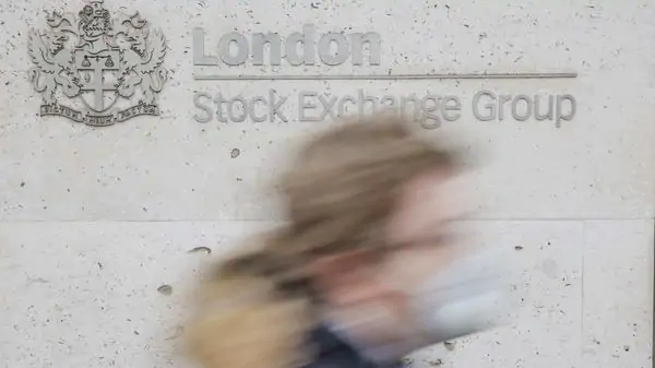 London stocks gain on fresh stimulus; retailers jump on record sales in Dec